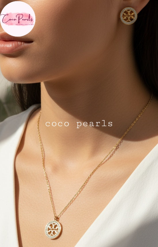 Coco Pearls Stainless Steel Anti tarnish Gold sparkly vibe necklace with a circular pendant with diamonds around on women neck