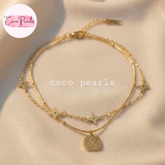 Coco Pearls Stainless steel Anti Tarnish Gold starry night anklet with star and square pendants on a beige surface