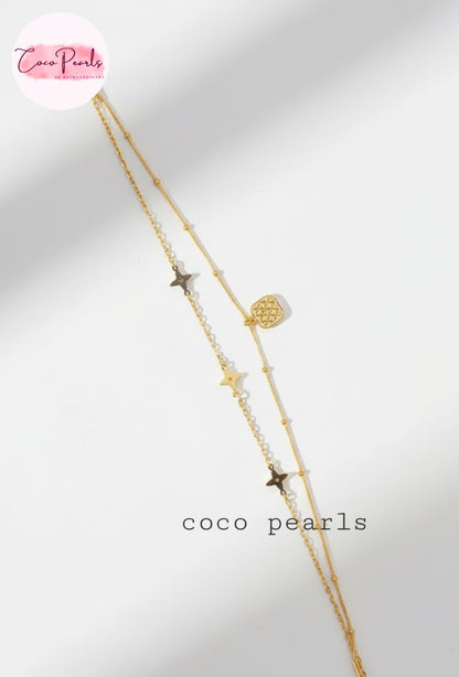 Coco Pearls Stainless steel Anti Tarnish Gold starry night anklet with star and heart pendants on a white background