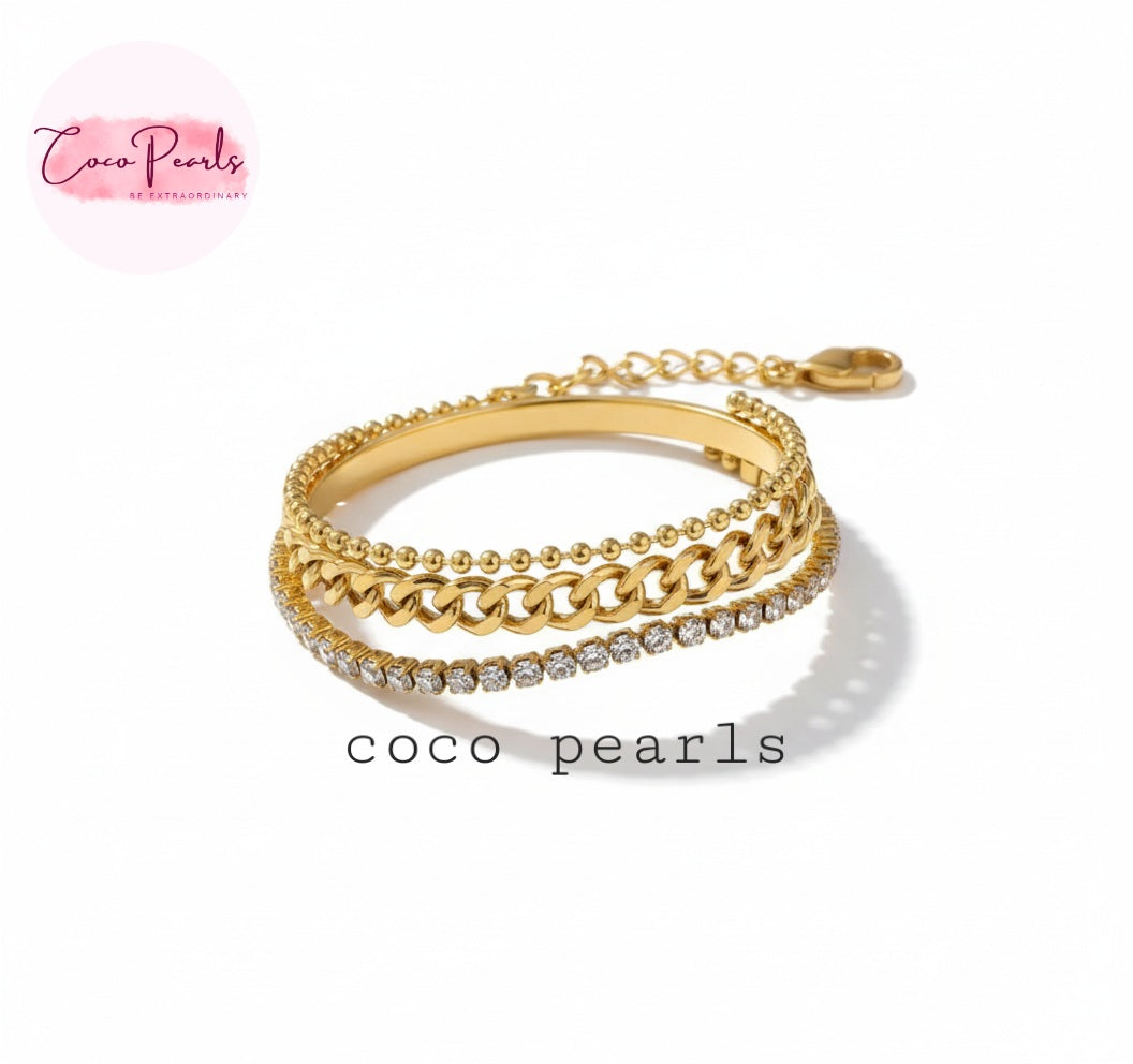 Coco Pearls Stainless Steel Anti Tarnish Gold triple threat glam bracelet with 3 layer bracelet. dot chain, thick chain and diamond accent stack displayed on white background