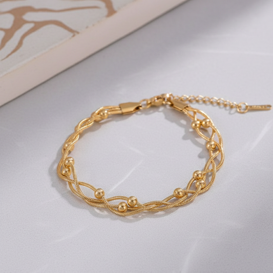 coco pearls stainless steel anti tarnish gold twisted braid bracelet with 3 ball chains twisted in a braid