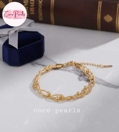 coco pearls stainless steel anti tarnish gold twisted braid bracelet with 3 ball chains twisted in a braid