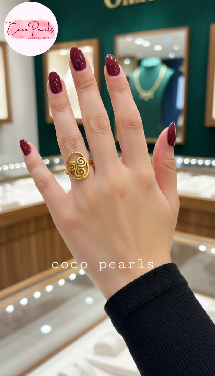 coco Pearls Stainless steel anti tarnish gold whirl ring displayed on hand