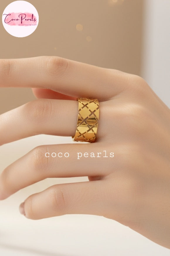 coco pearls stainless steel anti tarnish gold woven glow ring  displayed on hand
