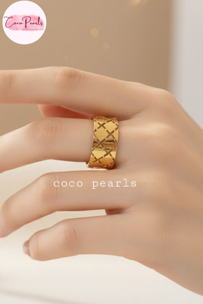 coco pearls stainless steel anti tarnish gold woven glow ring  displayed on hand